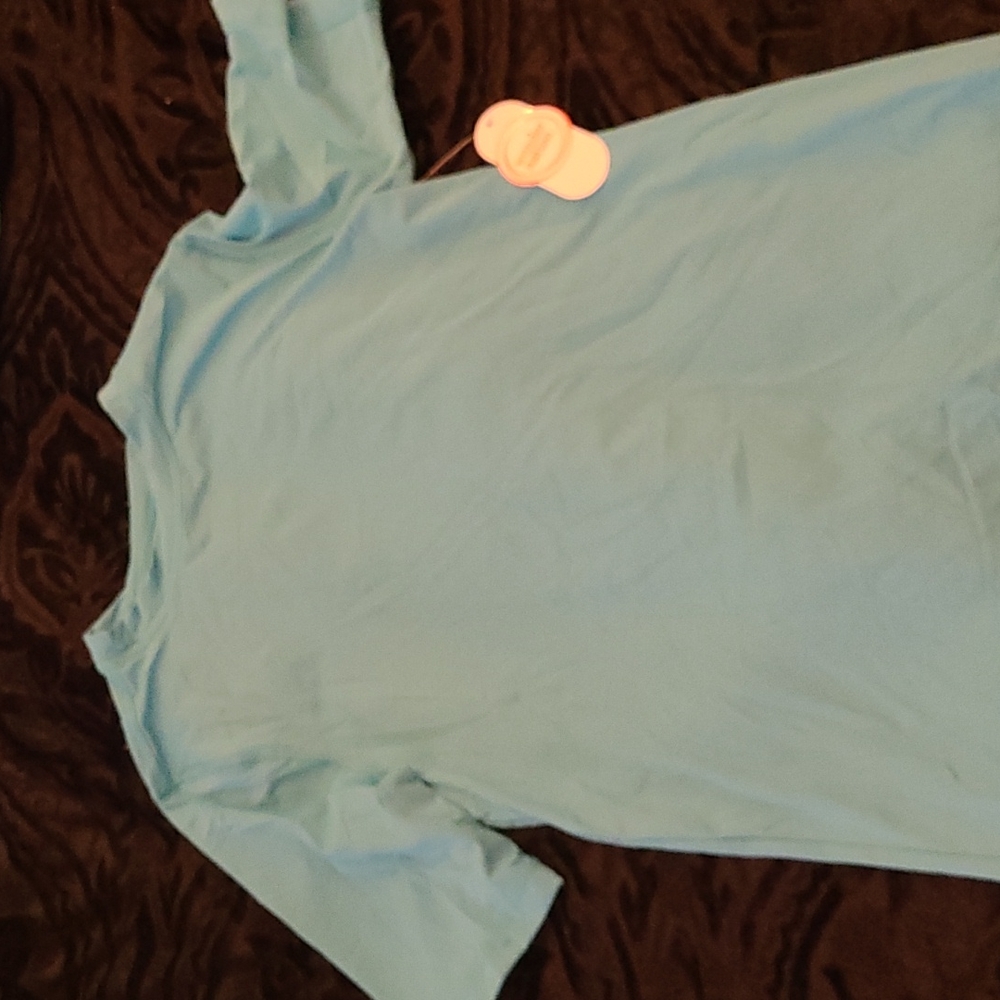 Wonder Nation Short Sleeve Rash Gaurd matches the swim truncks